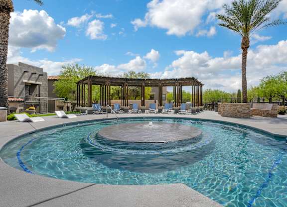 A pool with a blue line around it.