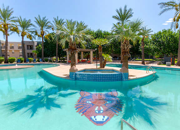 A person is sitting on a float in a pool.