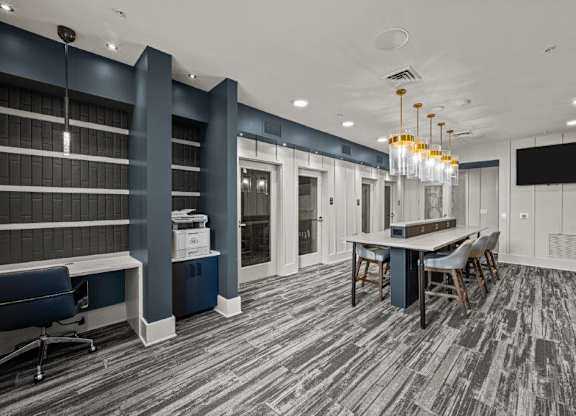 a conference room with a long table and chairs