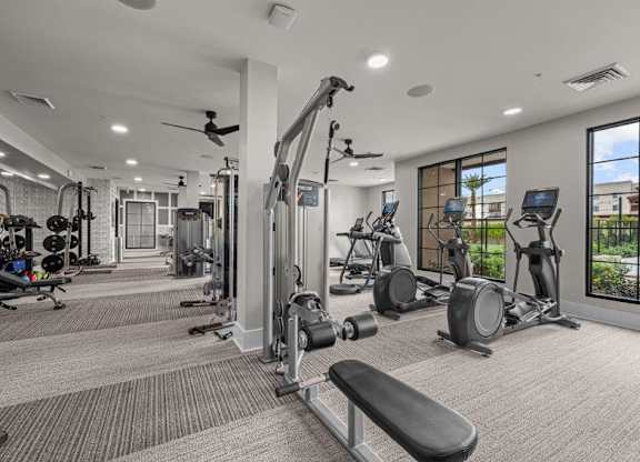 the gym is equipped with state of the art equipment including cardio machines and weights