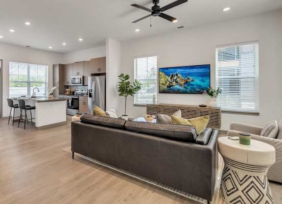 Slate at Fishers District Modern Villas and Townhomes in Fishers, Indiana Model Living Room and Kitchen