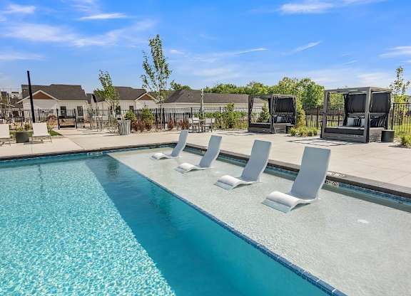 Slate at Fishers District Modern Villas and Townhomes in Fishers, Indiana Pool with Lounge Chairs