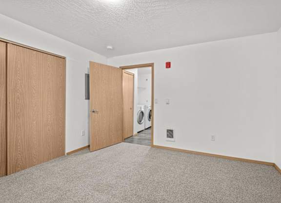 A laundry room with a washer and dryer.