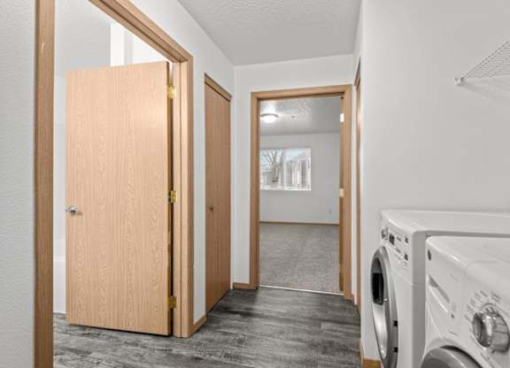 A laundry room with a washer and dryer.