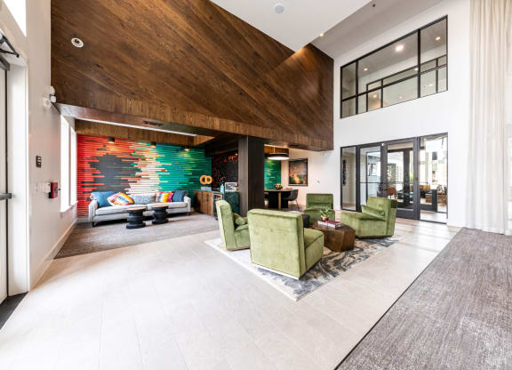 Lenox SoCo Apartments clubhouse area with seating