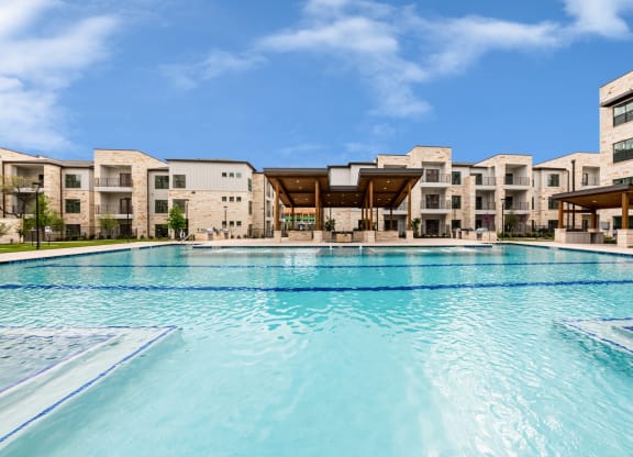 Lenox SoCo Apartments  large swimming pool with apartments in the background