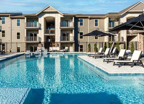 Station at St. Peters Apartments in St. Peters, Missouri Pool with Lounge Chairs