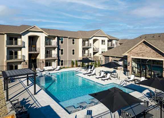 Station at St. Peters Apartments in St. Peters, Missouri Pool with Lounge Chairs