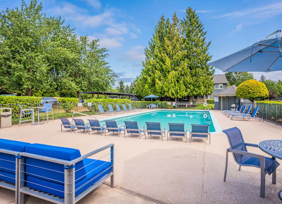 Stonesthrow Apartments Pool with Lounge Chairs