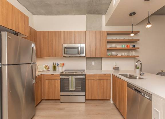 The Benedictine Apartments in Tucson, Arizona Model Kitchen with Built-In Shelving
