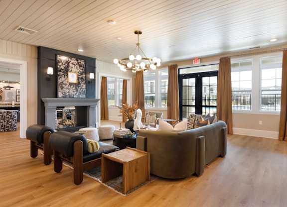 A living room with a fireplace and a couch.