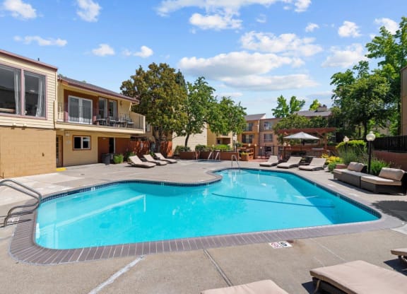 The Crest Pleasant Hill Apartments in California Pool with Lounge Chairs