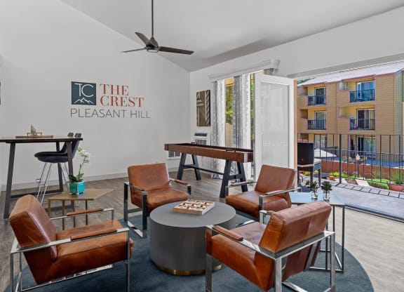 The Crest Pleasant Hill Apartments in California Clubhouse Lounge with Shuffleboard and Patio