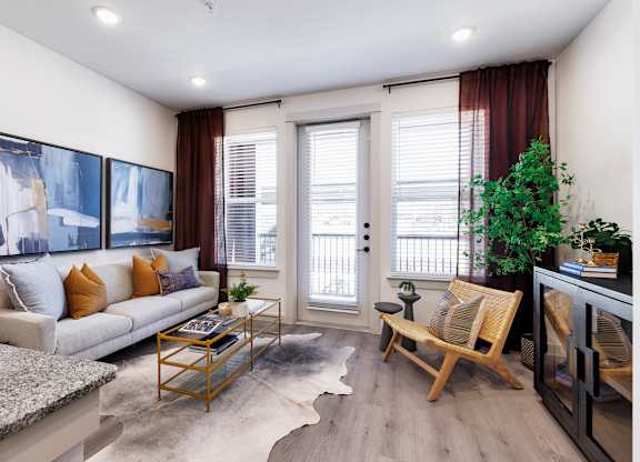 The Depot Apartments in Celina, Texas Living Room with Private Patio