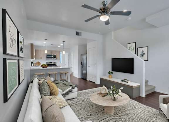 The Hedrick on Mountain Townhome-Style Apartments in Tucson, Arizona Model Living Room and Kitchen