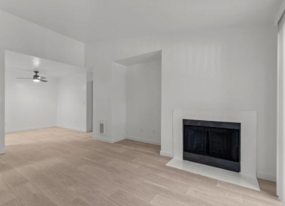 The Marina at Martha Lake Apartments in Bothell, WA Living Room with Fireplace