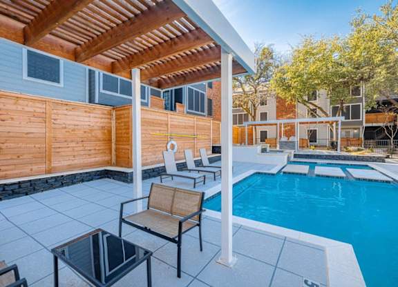 The Monet Apartments in Dallas, Texas Pool with Lounge Chairs