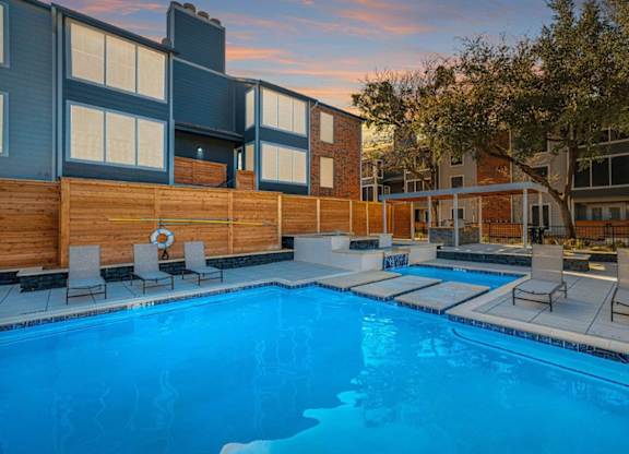 The Monet Apartments in Dallas, Texas Pool with Lounge Chairs