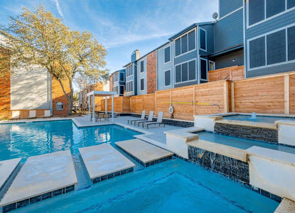 The Monet Apartments in Dallas, Texas Pool with Lounge Chairs