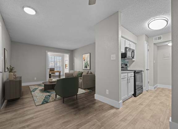 The Monet Apartments in Dallas, Texas Model Living Room and Kitchen
