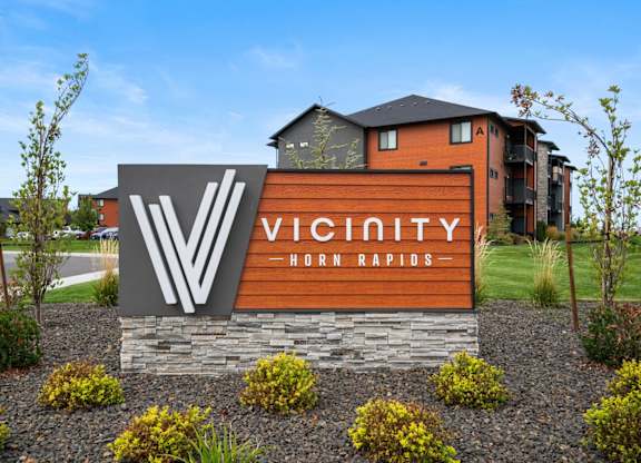 A sign for Vicinity in Horn Rapids is shown in front of a building.