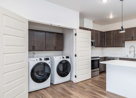 Vicinity at Horn Rapids Apartments Model Kitchen with Laundry