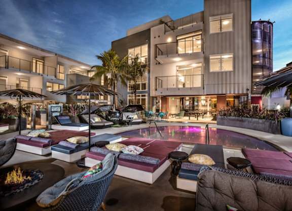 Vinz on Fairfax Apartments in Los Angeles, California Pool with Lounge Chairs at Dusk
