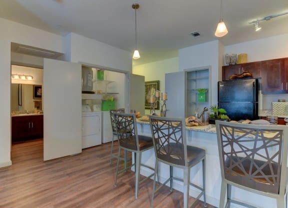 Volar Apartments Model Kitchen and Laundry Closet