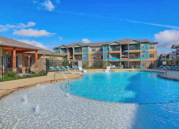 Volar Apartments Pool with Lounge Chairs