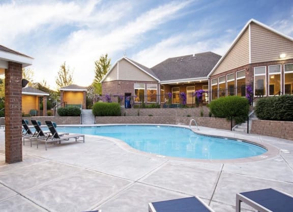 Outdoor Pool with Lounge Chairs at The Crossings at Chapel Hill, Pasco, 99301