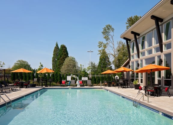 West End District Apartments in Beaverton, Oregon Pool with Lounge Chairs