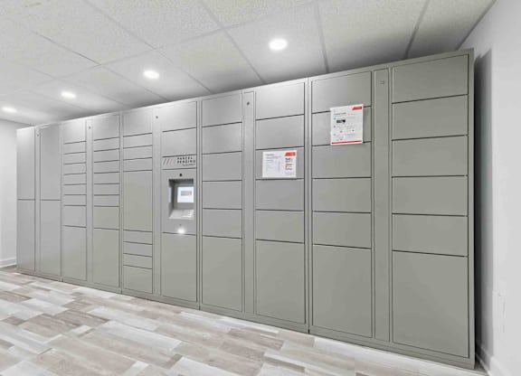 A row of grey metal lockers in a room.