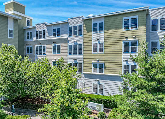 Apartment complex with a sign that says Park 87 at Park87 Apartments, Cambridge, MA, 02138