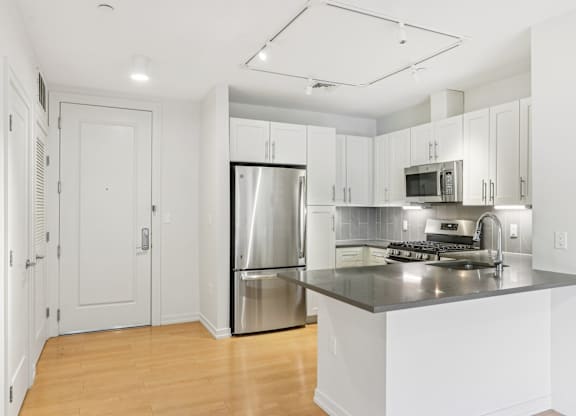 Kitchen with Modern appliances at Park77 Apartments, Cambridge