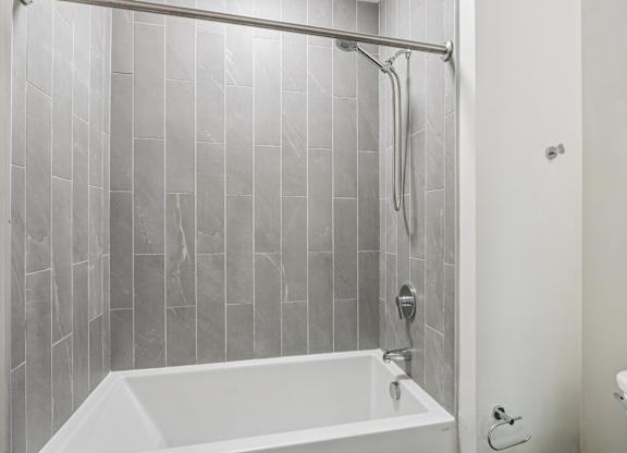 Bathroom with white bathtub at Park77 Apartments, Cambridge, MA, 02138