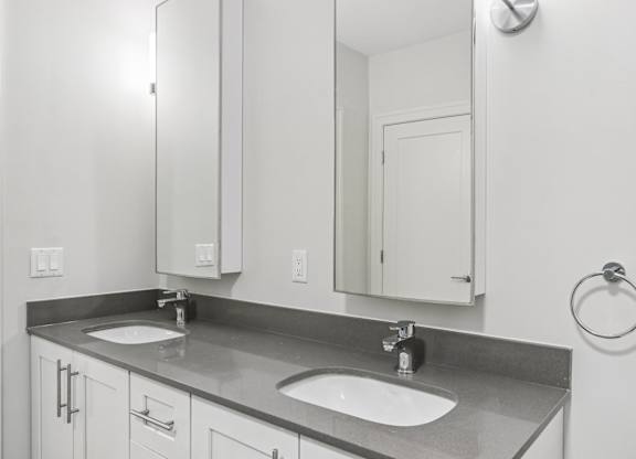 Bathroom with Sink, mirror and faucet at Park77 Apartments, Cambridge, 02138