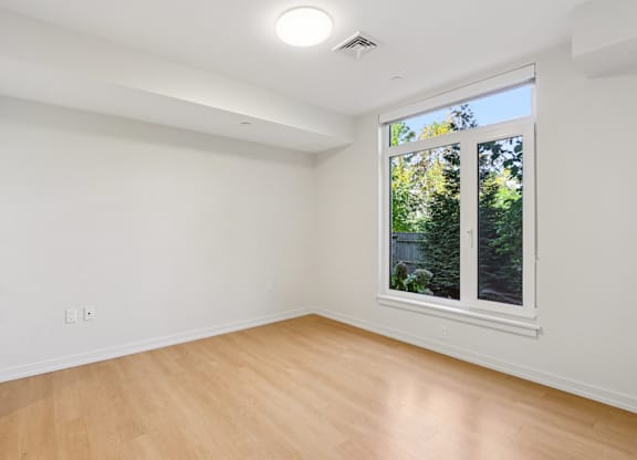 Bedroom with a window at Park77 Apartments, Cambridge