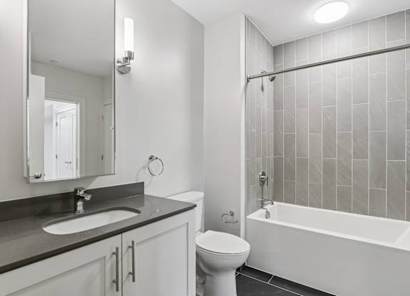 Bathroom with bathtub and toilet at Park77 Apartments, Massachusetts, 02138