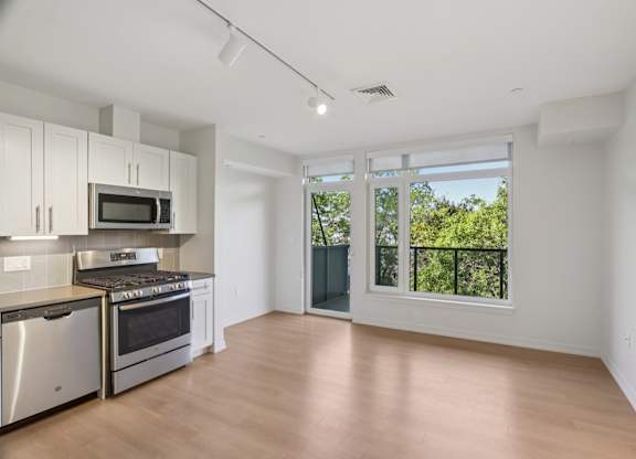 Kitchen with attached patio at Park77 Apartments, Cambridge, Massachusetts