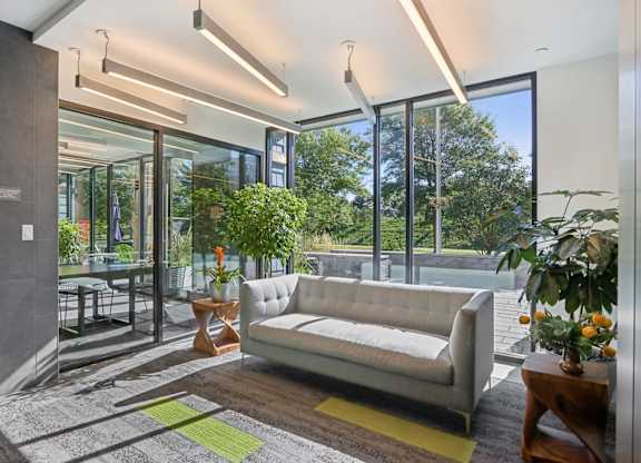 Modern living room with a couch at Park77 Apartments, Cambridge