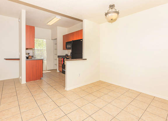 kitchen area with a refrigerator at San Miguel Apartments, Arizona 85212