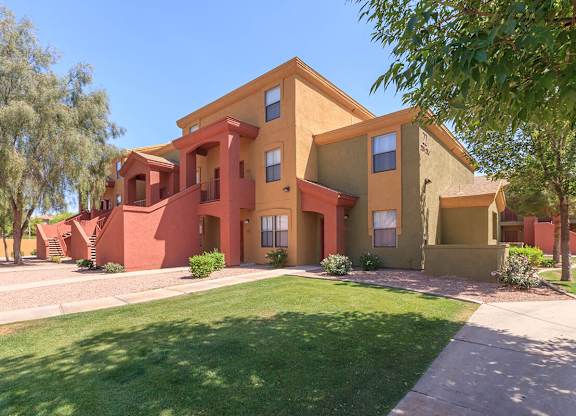 Building Exterior View with Lawn Area at San Lucas Apartments, Tolleson, 85353