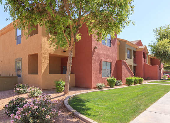 House Exterior with Greenery at San Lucas Apartments, Arizona, 85353