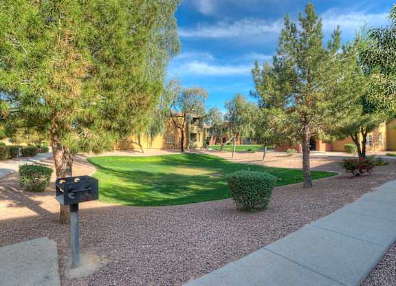 Mailbox on gravel path at San Bellino Apartments, Glendale, Arizona
