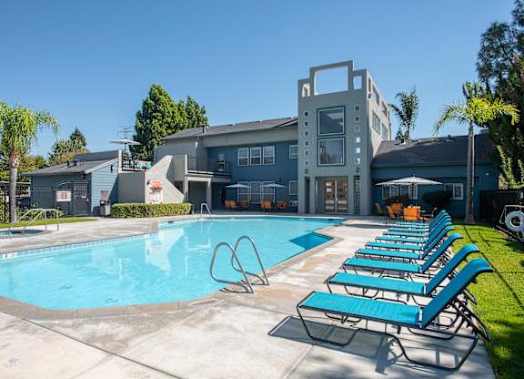 Swimming pool and clubhouse background at Autumn Oaks Apartments, Roseville, CA