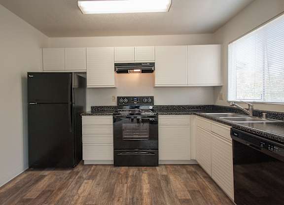 Vacant studio kitchen and appliances at Autumn Oaks Apartments, Roseville, CA