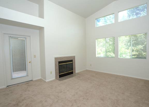 Autumn Oaks vacant 3x2 living room and fireplace