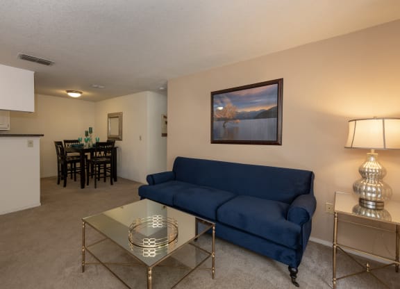 model living room and dining room views at Bishop's Court Apartments, CA 95670