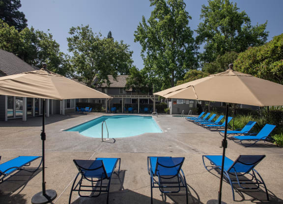 swimming pool and furniture at Bishop's Court Apartments, Rancho Cordova, CA