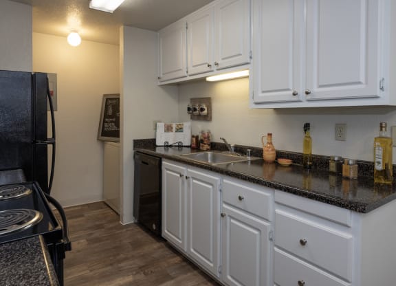 upgraded model kitchen and laundry area at Bishop's Court Apartments, Rancho Cordova, California 95670